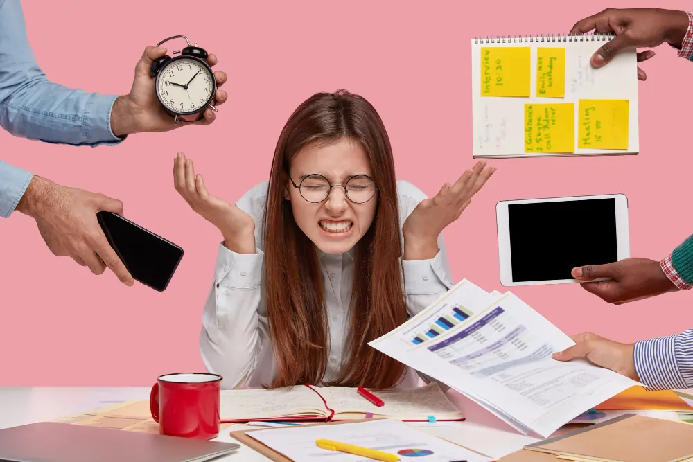 Signs of burnout shown through workplace stress, emotional exhaustion, and overwhelming multitasking demands