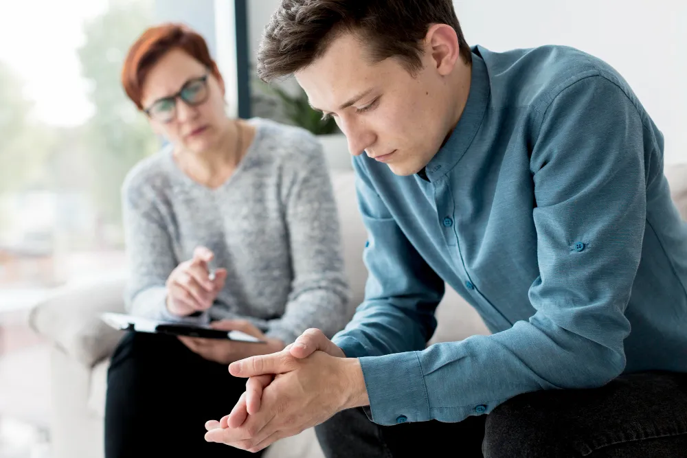 Adult ADHD diagnosis consultation in Australia showing patient discussing symptoms with a mental health professional.